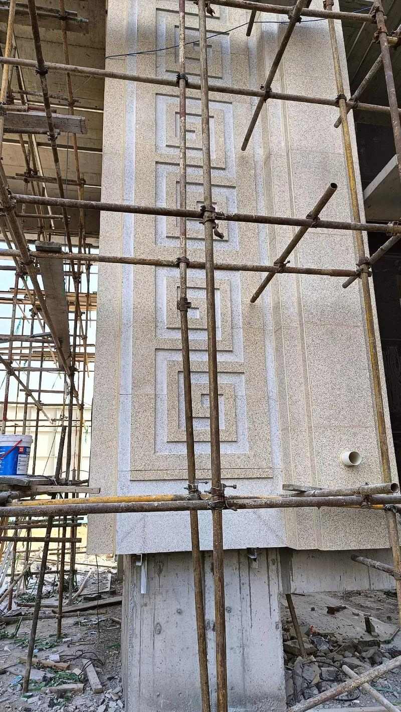 十堰 黄金麻花岗岩别墅外墙干挂回纹造型效果