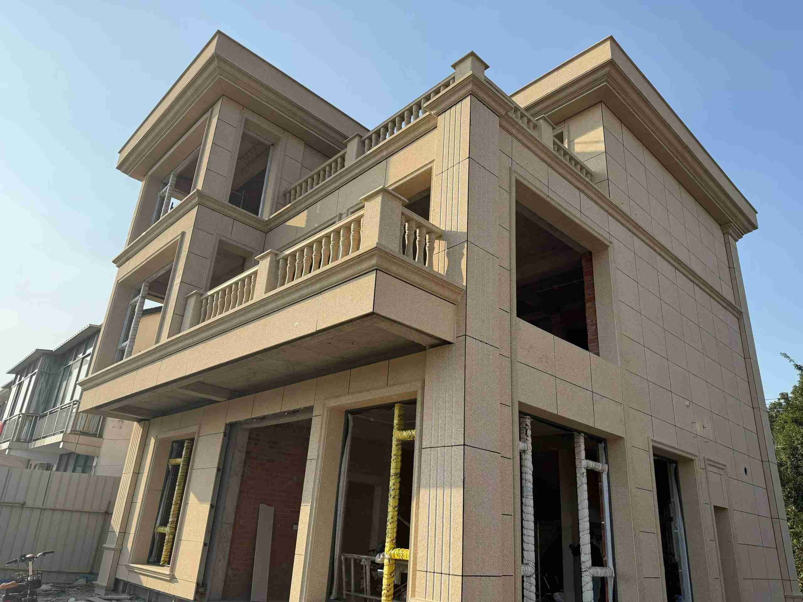 十堰 黄金麻花岗岩石材荔枝面外墙干挂效果展示