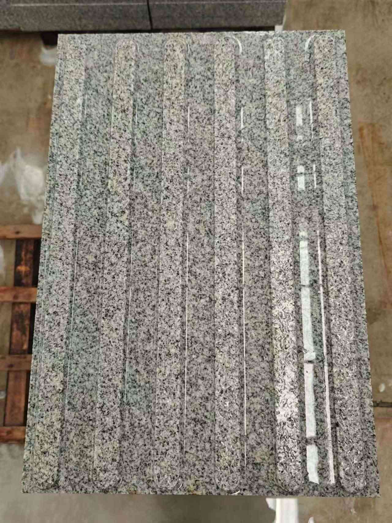 十堰 芝麻白花岗岩荔枝面雕刻盲道，盲条